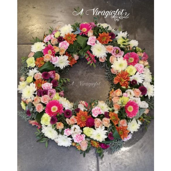 Colorful mixed flower funeral wreath