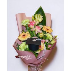 Pink flower bouquet with a graduation cap