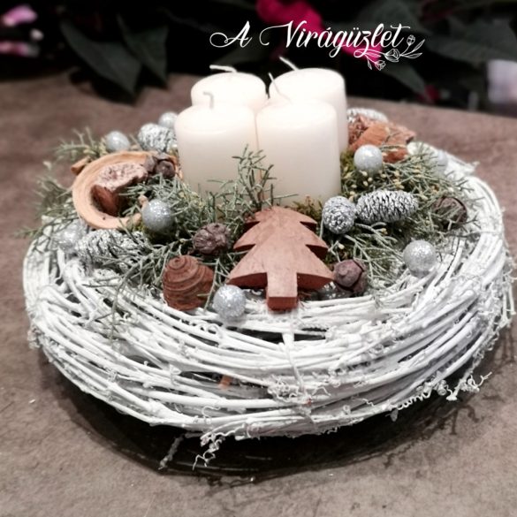 White Advent wreath with natural decorations