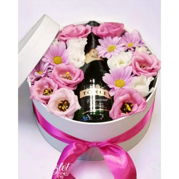 Pretty pink flower box with champagne