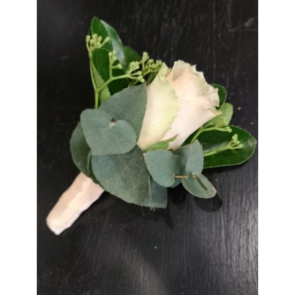 Eucalyptus-adorned wedding boutonniere