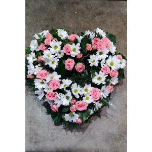 Heart-shaped wreath with mixed flowers