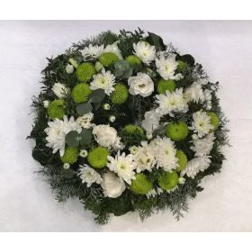 Round funeral wreaths with a hole in the middle