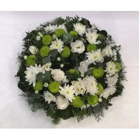 Round funeral wreaths with a hole in the middle